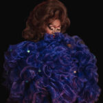 Color photograph taken by Chris Attig Blue Bus Photos showing Arkansas Drag Queen Jazmyn Turrelle Foster performing at the 2023 Miss Gay Central Arkansas America Drag Pageant in Conway, Arkansas.