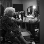 Color photograph taken by Chris Attig Blue Bus Photos as Arkansas drag queens gigi galore and chenal heffington and jazmyn turrelle foster prepare in the dressing room for their performances at Miss Gay Central Arkansas America 2023 Drag Pageant in Conway, Arkansas.