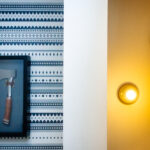 Color photograph showing color temperature change in design of bathroom in Hewing Hotel in Minneapolis, Minnesota