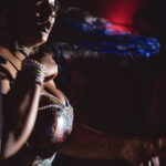 closeup color image of of Little Rock Arkansas Drag Queen Moan A Lott performing at Diamonds and Pearls at Club Sway