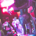 black and white image of of Little Rock Arkansas Drag Queen Devi Diamond performing at Diamonds and Pearls at Club Sway while dancing and collecting tips from the audience