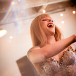Image of Drag Artist perrforming as Taylor Swift at Fassler Hall taken by Little Rock Arkansas Queer Photographer Gynger