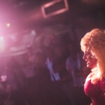 Fayetteville Drag Queen Day Len performs as Dolly Parton at Taylor Madison Monroe's weekly Sunday Showcase at Club C4 in Fayetteville, Arkansas