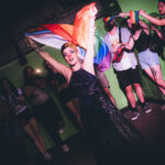 Fayetteville non binary drag artist Emerald Haze performing a number from Les Miserables "empty tables and empty chairs" mixed with "do you hear the people sing" at Taylor Madison Monroe's weekly Sunday Showcase at Club C4 in Fayetteville, Arkansas,