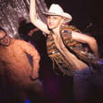 Skyler teaches country line dancing at Stormey Weathers bimonthly Drag show Titties and Queers in the Capitol of Drag in Little Rock Arkansas at Club Sway