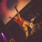 Little Rock Drag artist and Burlesque performer Moss Arati performing at Stormey Weather's bimonthly Drag show Titties and Queers in the Capitol of Drag in Little Rock Arkansas at Club Sway