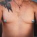 Trans woman and queer photographer Gynger St Claire shows change in her chest shape after 36 days on estrogen